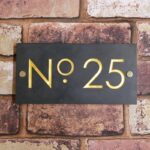 Slate-house-sign-with-gold-numbers