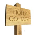 Carved-oak-house-sign-with-posts