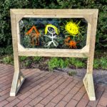 Early years, outdoor learning, painting and drawing playground easel.