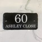 Bespoke house signs made in Kent by Snobs Signs. Black slate house signs with any house name and number.