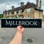 Long name slate house sign with bevelled edge by Snobs Signs. A long slate sign deep engraved with a house name. The long slate sign is dark in colour - often being referred to as 'black slate'.